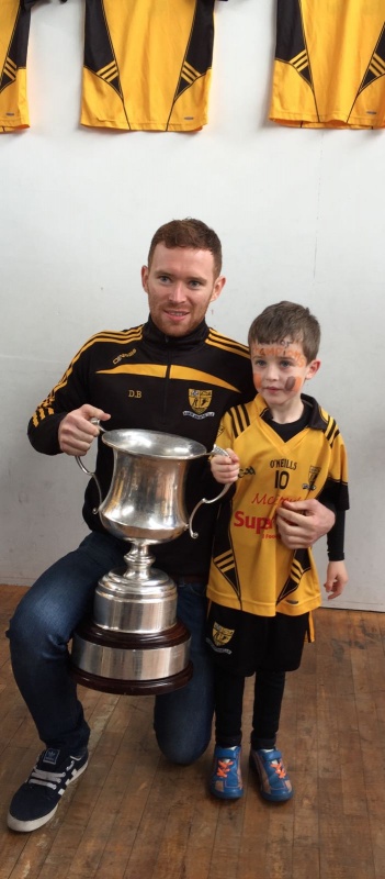 county champion James Brady and the Oliver Plunkett cup. Well done Ramor Utd!